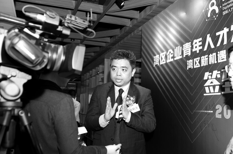 Danny Chan speaking to the media